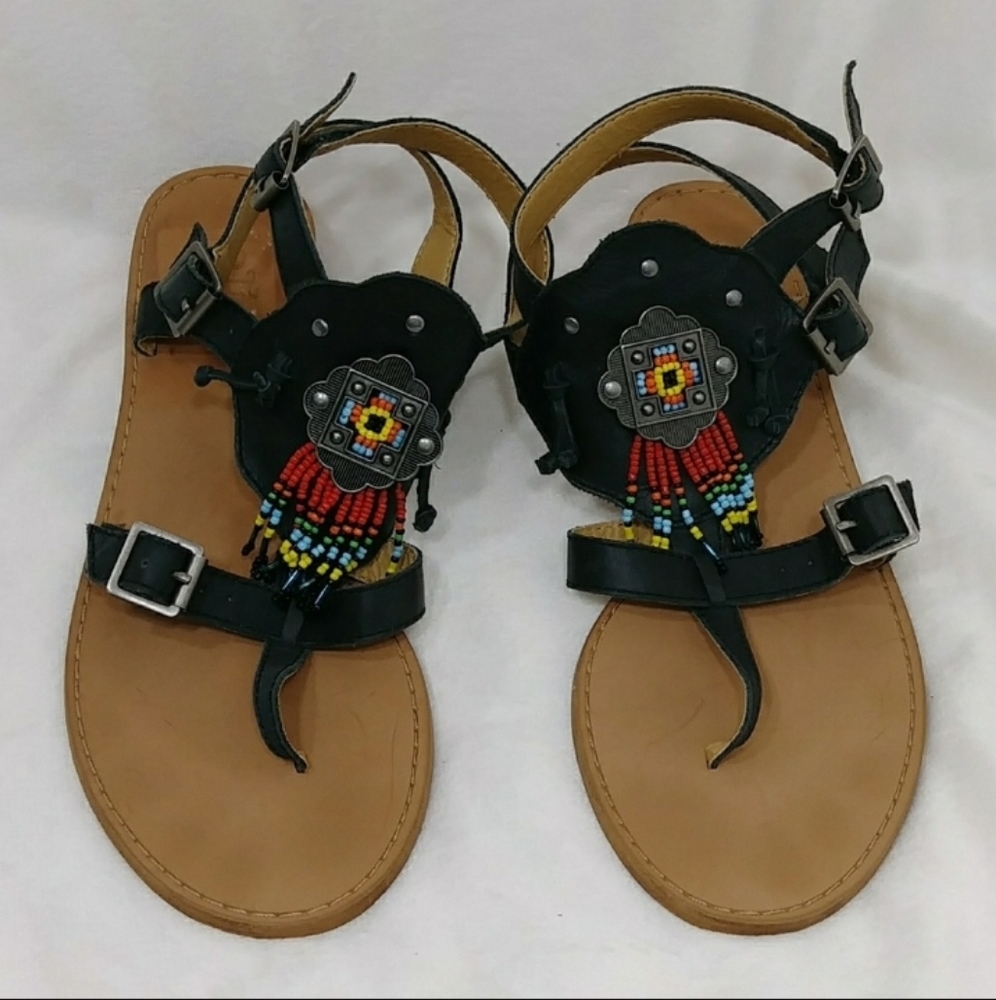 Anthropologie.  Sandals with studed design